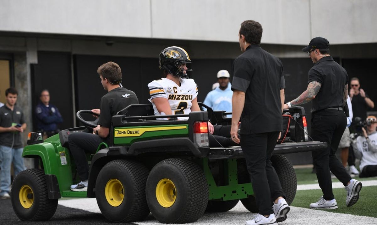 Oct 25, 2025; Nashville, Tennessee, USA; Missouri Tigers quarterback Beau Pribula (9) is carted from the field by medical personnel after he was injured on a fourth down run against the Vanderbilt Commodores during the third quarter at FirstBank Stadium. Mandatory Credit: Steve Roberts-Imagn Images