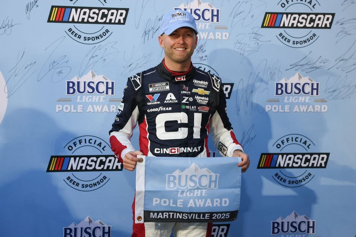 Oct 25, 2025; Martinsville, Virginia, USA; NASCAR Cup Series driver William Byron (24) poses following winning the pole for NASCAR Cup Series Xfinity 500 at Martinsville Speedway. Mandatory Credit: Greg Atkins-Imagn Images