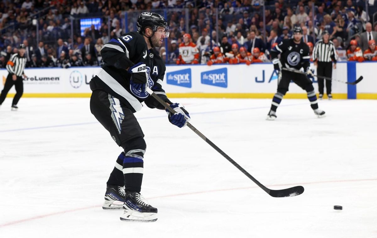 Oct 25, 2025; Tampa, Florida, USA; Tampa Bay Lightning right wing Nikita Kucherov (86) passes the puck against the Anaheim Ducks during the third period at Benchmark International Arena. Mandatory Credit: Kim Klement Neitzel-Imagn Images
