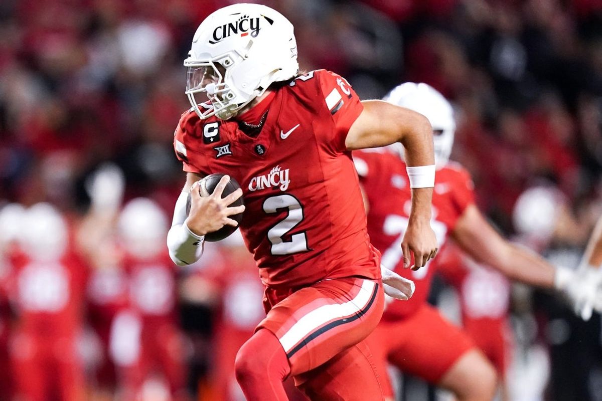 Cincinnati Bearcats quarterback Brendan Sorsby (2) runs the ball to the end zone for a touchdown in the fourth quarter of a NCAA men’s football game between the Cincinnati Bearcats and Baylor Bears, Saturday, Oct. 25, 2025, at Nippert Stadium in Cincinnati. Bearcats won 41-20.