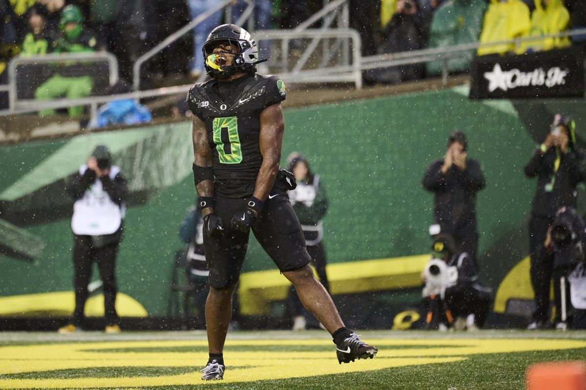 Oct 25, 2025; Eugene, Oregon, USA; Oregon Ducks running back Jordon Davison (0) celebrates scoring a touchdown during the first half against the Wisconsin Badgers at Autzen Stadium. Mandatory Credit: Troy Wayrynen-Imagn Images