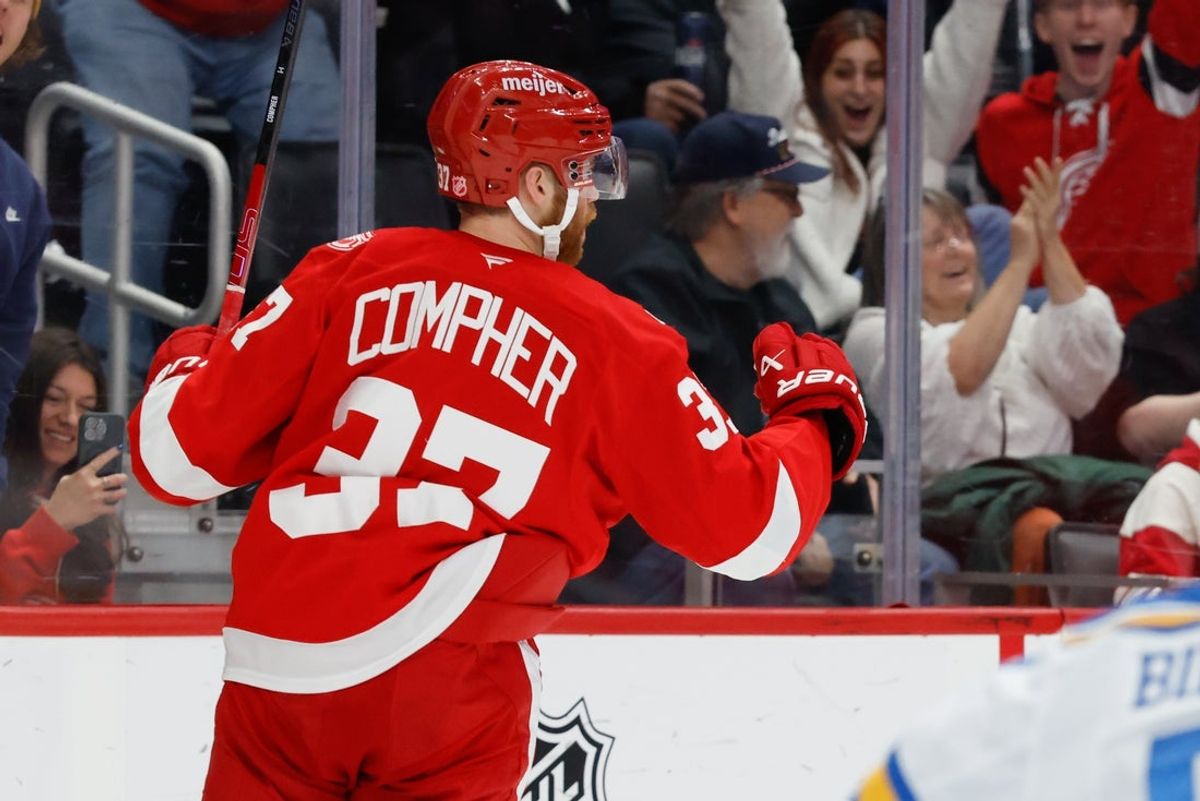 Oct 25, 2025; Detroit, Michigan, USA;  Detroit Red Wings left wing J.T. Compher (37) celebrates after scoring in the second period against the St. Louis Blues at Little Caesars Arena. Mandatory Credit: Rick Osentoski-Imagn Images