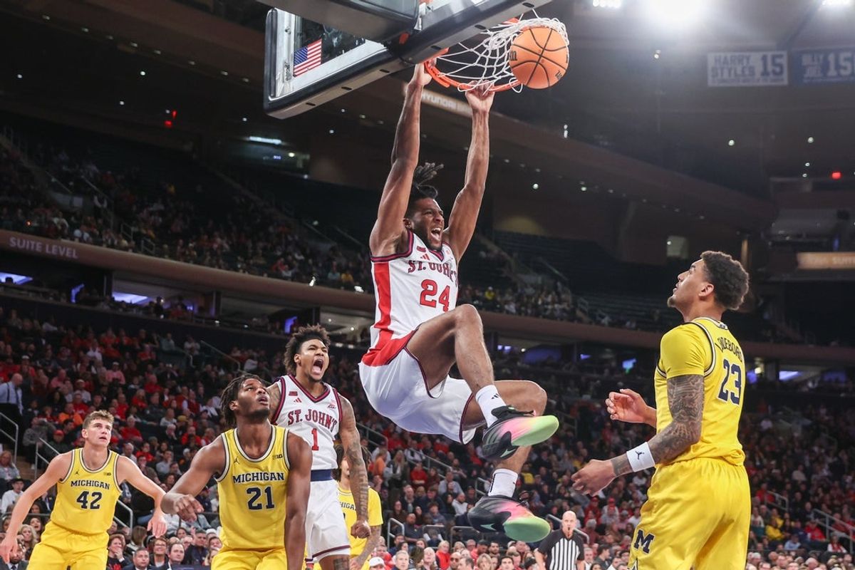 Oct 25, 2025; New York, NY, USA;  St. John's Red Storm forward Zuby Ejiofor (24) dunks in the second half against the Michigan Wolverines at Madison Square Garden. Mandatory Credit: Wendell Cruz-Imagn Images