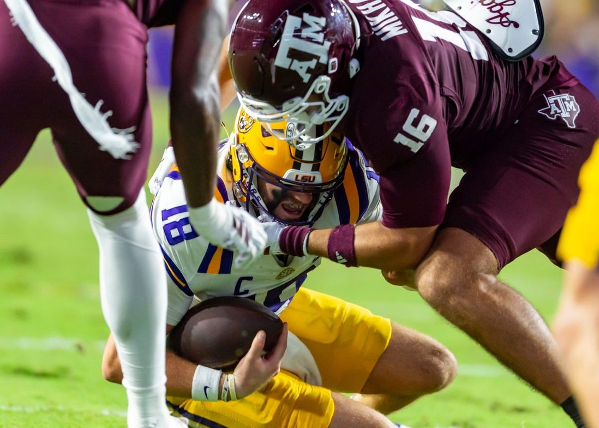 Tigers Quarterback Garrett Nussmeier 18 is sacked as LSU Tigers take on the Texas A&M Aggies. October 25, 2025; Baton Rouge, Louisiana, USA; at Tiger Stadium. Saturday, Oct. 25, 2025.