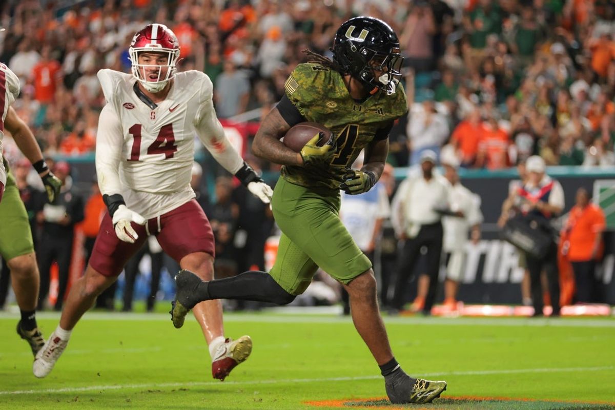 Oct 25, 2025; Miami Gardens, Florida, USA; Miami Hurricanes running back Mark Fletcher Jr. (4) carries the football for a touchdown against the Stanford Cardinal during the third quarter at Hard Rock Stadium. Mandatory Credit: Sam Navarro-Imagn Images