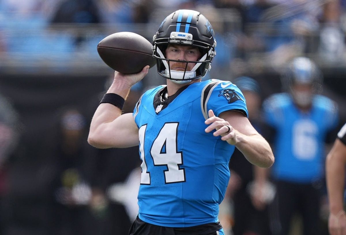 Oct 26, 2025; Charlotte, North Carolina, USA; Carolina Panthers quarterback Andy Dalton (14) throws during the first half against the Buffalo Bills at Bank of America Stadium. Mandatory Credit: Jim Dedmon-Imagn Images
