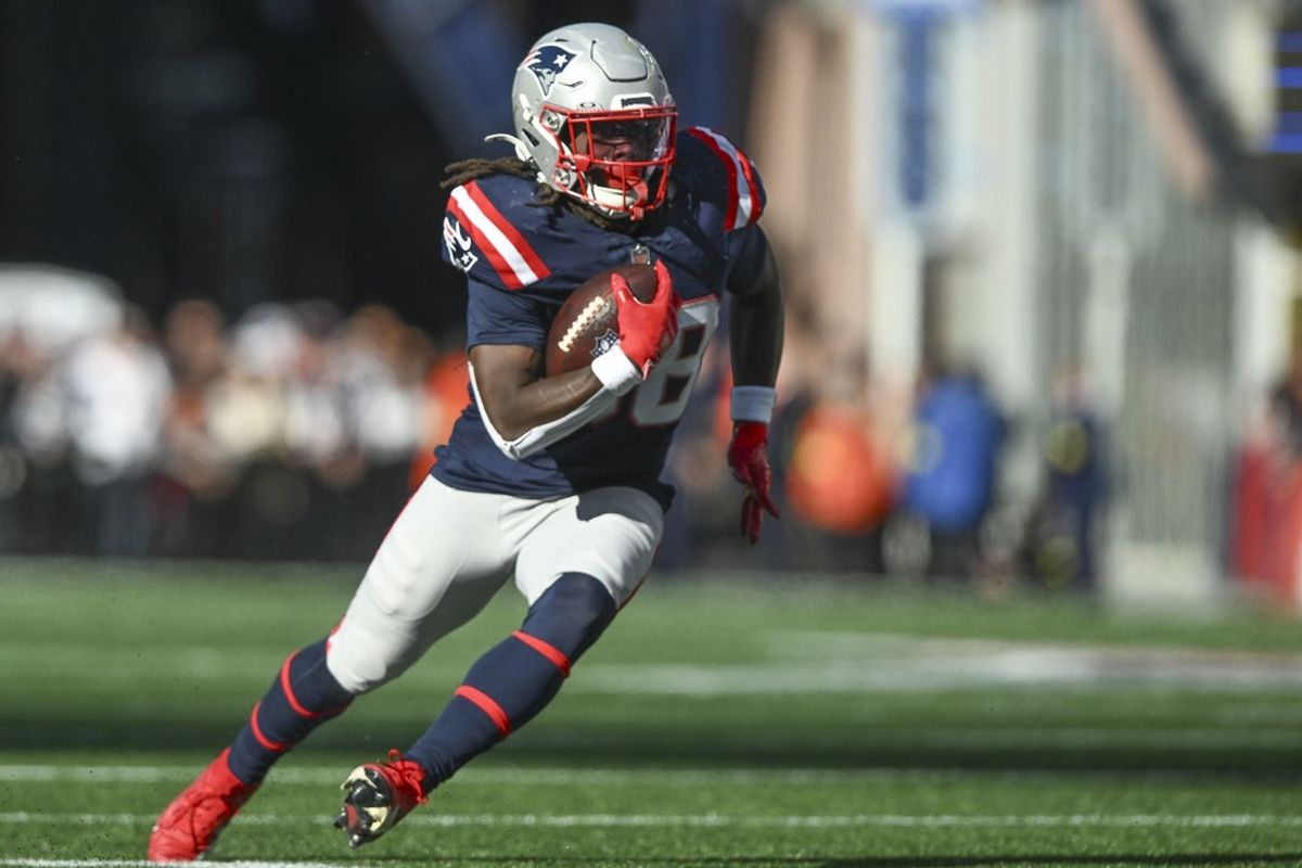 Oct 26, 2025; Foxborough, Massachusetts, USA;  New England Patriots running back Rhamondre Stevenson (38) runs with the ball during the third quarter against the Cleveland Browns at Gillette Stadium. Mandatory Credit: Brian Fluharty-Imagn Images