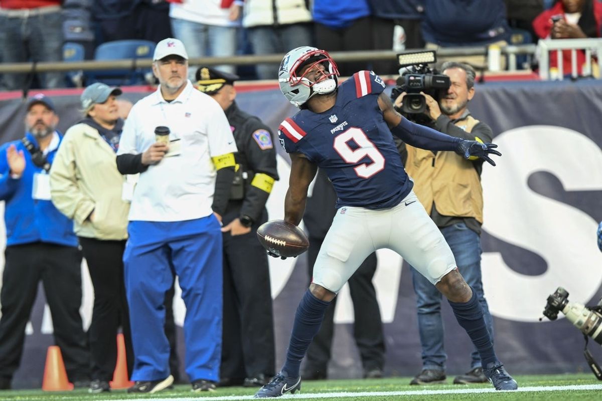 Oct 26, 2025; Foxborough, Massachusetts, USA;  New England Patriots wide receiver Kayshon Boutte (9) scores a touchdown  during the third quarter against the Cleveland Browns at Gillette Stadium. Mandatory Credit: Brian Fluharty-Imagn Images