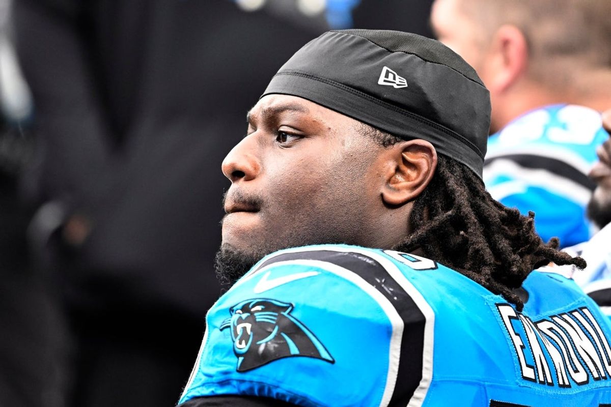 Oct 26, 2025; Charlotte, North Carolina, USA;  Carolina Panthers offensive tackle Ikem Ekwonu (79) on the bench in the fourth quarter against the Buffalo Bills at Bank of America Stadium. Mandatory Credit: Bob Donnan-Imagn Images