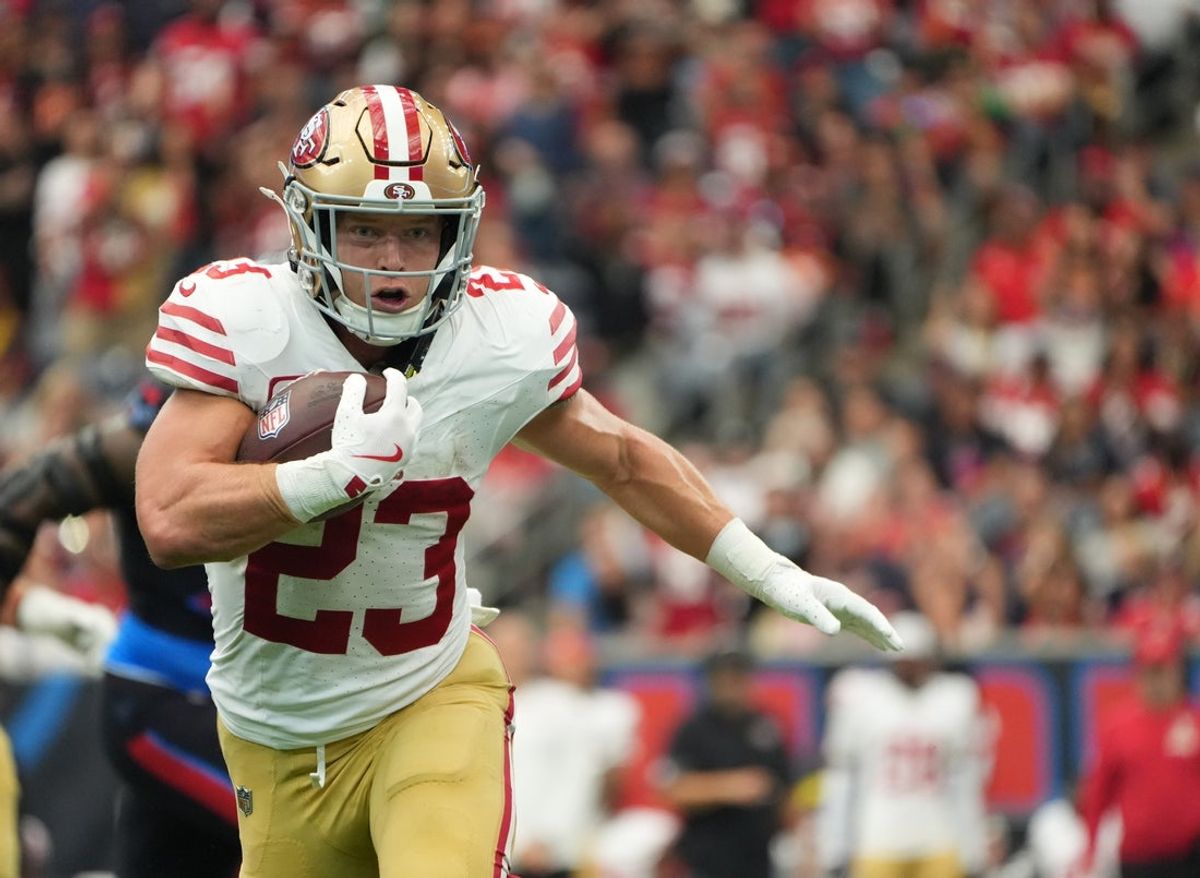 Oct 26, 2025; Houston, Texas, USA; San Francisco 49ers running back Christian McCaffrey (23) runs for a gain during the second half against the Houston Texans at NRG Stadium. Mandatory Credit: Sean Thomas-Imagn Images