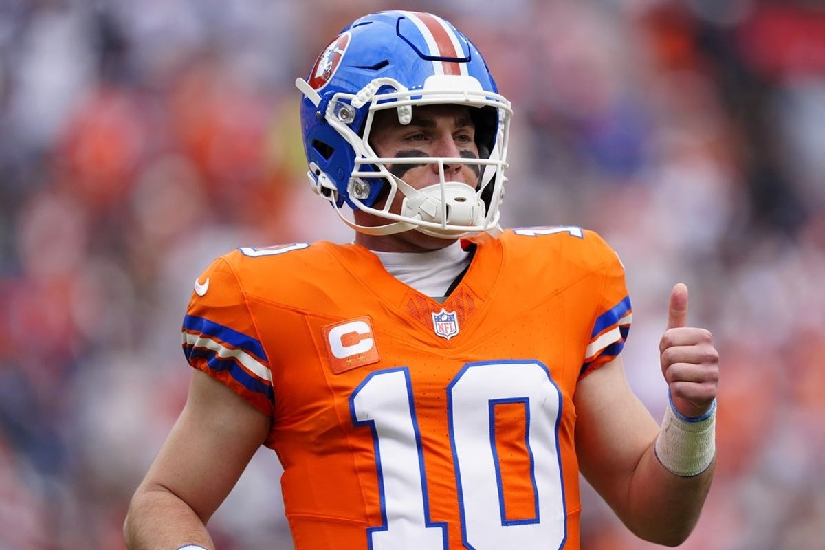 Oct 26, 2025; Denver, Colorado, USA; Denver Broncos quarterback Bo Nix (10) reacts in the first quarter against the Dallas Cowboys at Empower Field at Mile High. Mandatory Credit: Ron Chenoy-Imagn Images