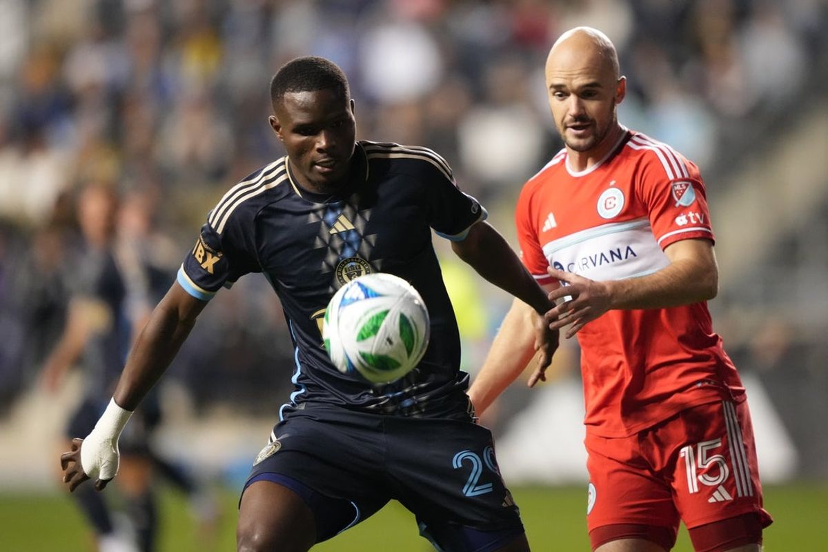 Oct 26, 2025; Chester, Pennsylvania, USA; Philadelphia Union defender Olwethu Makhanya (29) battles for the ball against Chicago Fire FC defender Andrew Gutman (15) in the second half at Subaru Park. Mandatory Credit: Kyle Ross-Imagn Images
