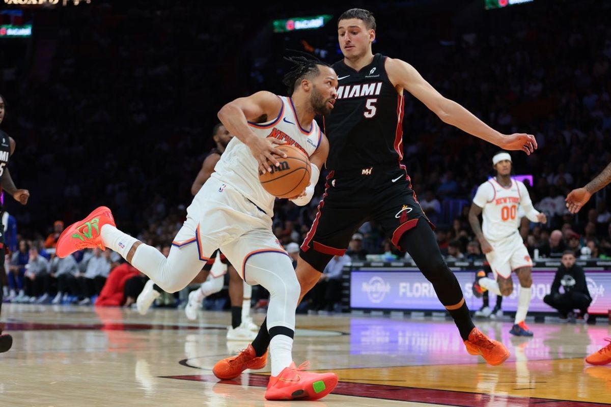 Oct 26, 2025; Miami, Florida, USA; New York Knicks guard Jalen Brunson (11) drives to the basket against Miami Heat forward Nikola Jovic (5) during the fourth quarter at Kaseya Center. Mandatory Credit: Sam Navarro-Imagn Images