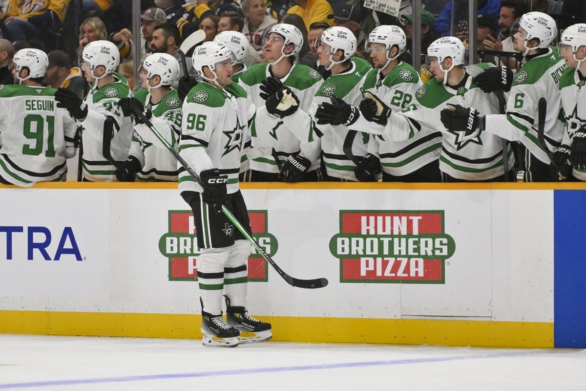 Oct 26, 2025; Nashville, Tennessee, USA;  Dallas Stars right wing Mikko Rantanen (96) celebrates with his teammates after scoring a goal against the Nashville Predators during the third period at Bridgestone Arena. Mandatory Credit: Steve Roberts-Imagn Images