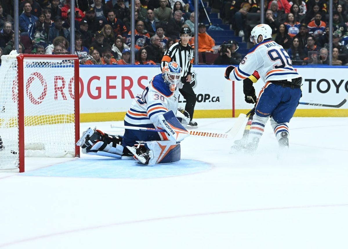 Oct 26, 2025; Vancouver, British Columbia, CAN; Vancouver Canucks left wing Kiefer Sherwood (44) scores goal against Edmonton Oilers goaltender Calvin Pickard (30) at Rogers Arena. Mandatory Credit: Simon Fearn-Imagn Images