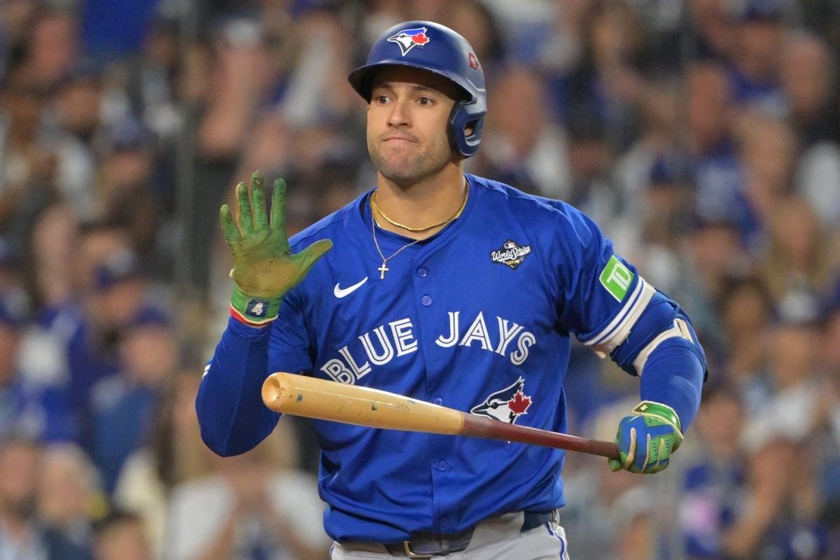 Oct 27, 2025; Los Angeles, California, USA; Toronto Blue Jays right fielder George Springer (4) reacts after striking out in the fourth inning against the Los Angeles Dodgers during game three of the 2025 MLB World Series at Dodger Stadium. Mandatory Credit: Jayne Kamin-Oncea-Imagn Images