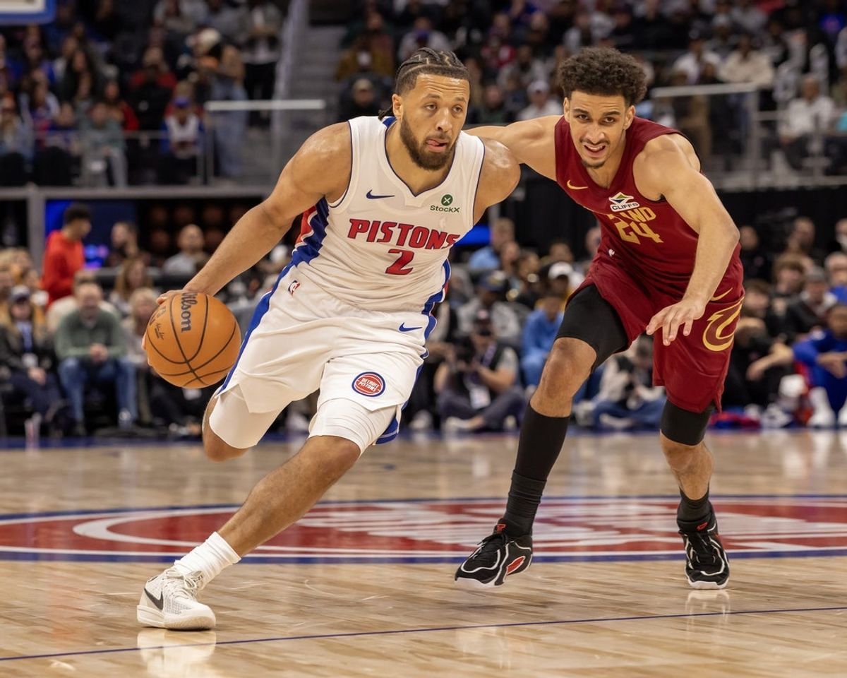Oct 27, 2025; Detroit, Michigan, USA; Detroit Pistons guard Cade Cunningham (2) moves the ball up court as Cleveland Cavaliers guard Tyrese Proctor (24) defends during the first half at Little Caesars Arena. Mandatory Credit: David Reginek-Imagn Images