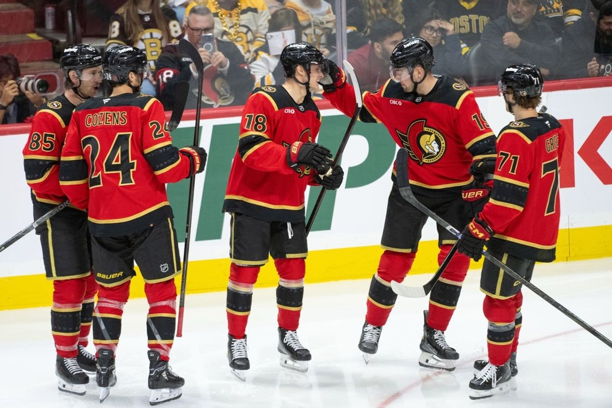 Oct 27, 2025; Ottawa, Ontario, CAN; Ottawa Senators center Tim Stutzle (18) is congratualed by right wing Drake Batherson (19) after scoring a goal in the third period against the Boston Bruins at the Canadian Tire Centre. Mandatory Credit: Marc DesRosiers-IMAGN Images