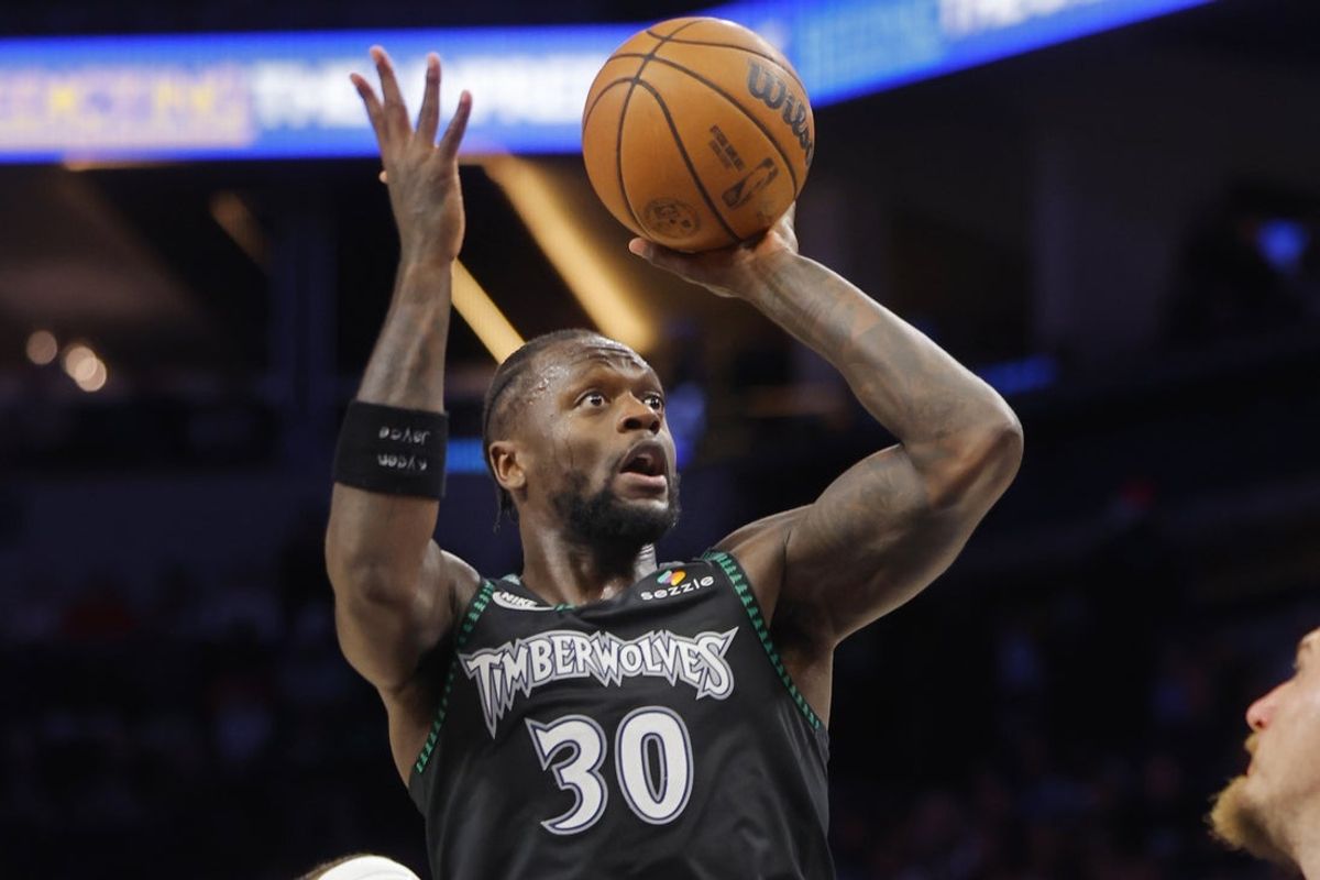 Oct 27, 2025; Minneapolis, Minnesota, USA; Minnesota Timberwolves forward Julius Randle (30) shoots against the Denver Nuggets in the third quarter at Target Center. Mandatory Credit: Bruce Kluckhohn-Imagn Images