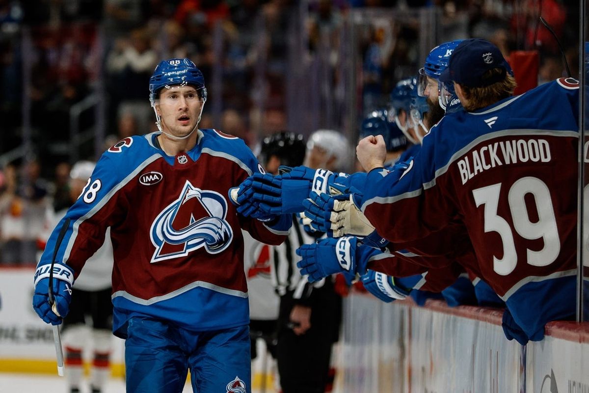 Oct 28, 2025; Denver, Colorado, USA; Colorado Avalanche center Martin Necas (88) celebrates with the bench after his goal in the first period against the New Jersey Devils at Ball Arena. Mandatory Credit: Isaiah J. Downing-Imagn Images
