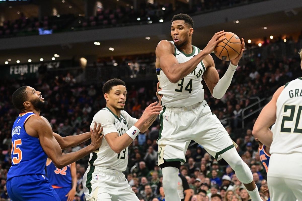 Oct 28, 2025; Milwaukee, Wisconsin, USA;  Milwaukee Bucks forward Giannis Antetokounmpo (34) grabs a rebound in the 3rd quarter against the New York Knicks at Fiserv Forum. Mandatory Credit: Benny Sieu-Imagn Images