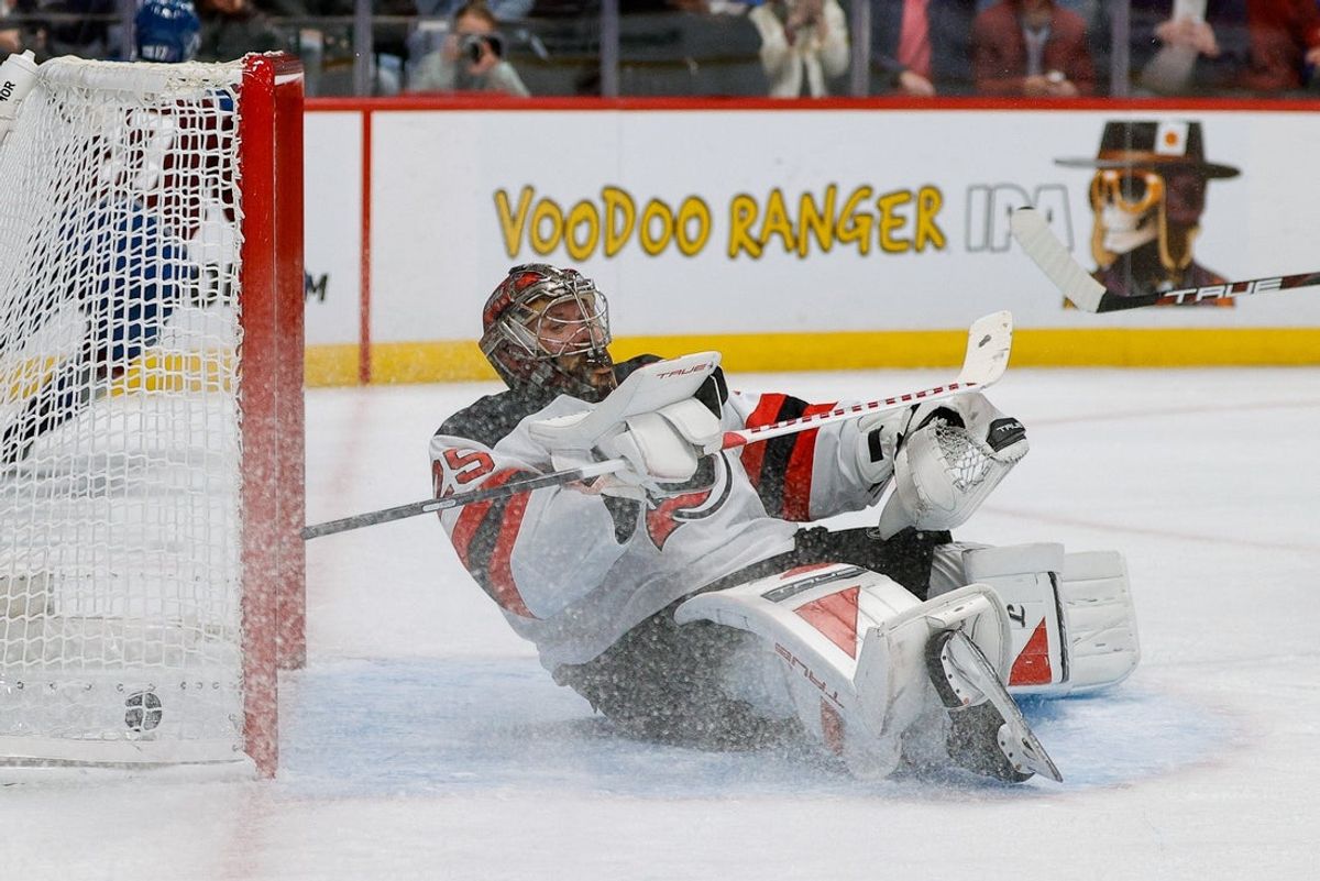Oct 28, 2025; Denver, Colorado, USA; New Jersey Devils goaltender Jacob Markstrom (25) lies on his back after giving up a goal in the second period against the Colorado Avalanche at Ball Arena. Mandatory Credit: Isaiah J. Downing-Imagn Images
