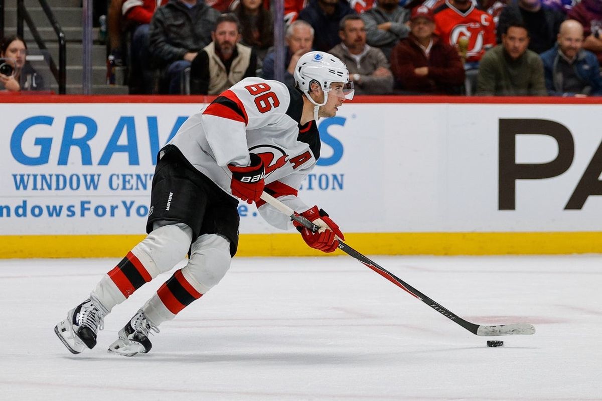 Oct 28, 2025; Denver, Colorado, USA; New Jersey Devils center Jack Hughes (86) controls the puck in the second period against the Colorado Avalanche at Ball Arena. Mandatory Credit: Isaiah J. Downing-Imagn Images
