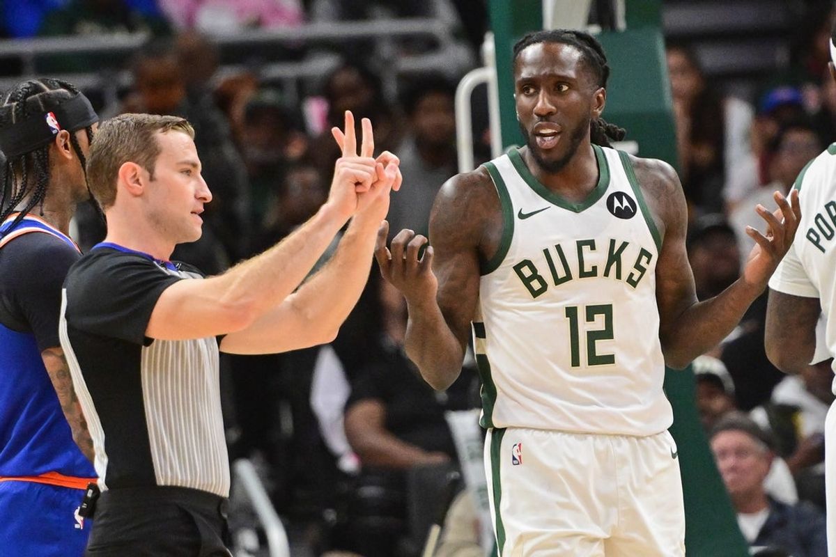 Oct 28, 2025; Milwaukee, Wisconsin, USA; Milwaukee Bucks guard Taurean Prince (12) reacts to a foul call by referee Brandon Schwab in the second quarter at Fiserv Forum. Mandatory Credit: Benny Sieu-Imagn Images