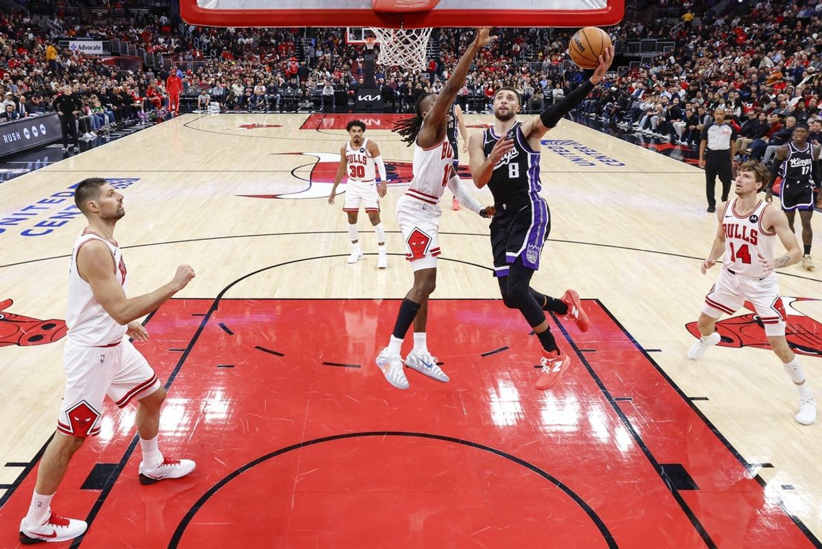 Oct 29, 2025; Chicago, Illinois, USA; Sacramento Kings guard Zach LaVine (8) goes to the basket against the Chicago Bulls during the first half at United Center. Mandatory Credit: Kamil Krzaczynski-Imagn Images