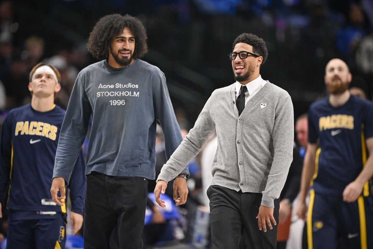 Oct 29, 2025; Dallas, Texas, USA; Indiana Pacers forward Obi Toppin (left) and guard Tyrese Haliburton (right) walk on to the court during the first quarter at the American Airlines Center. Mandatory Credit: Jerome Miron-Imagn Images