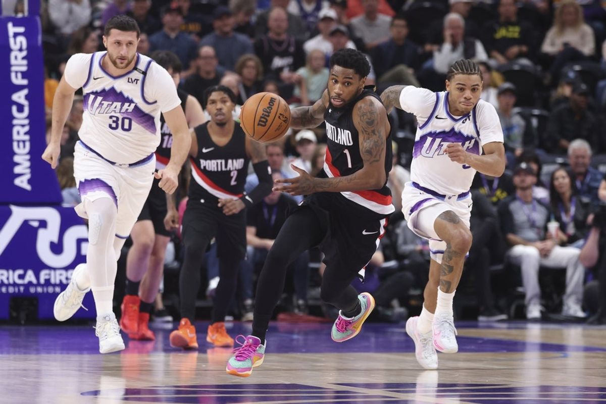 Oct 29, 2025; Salt Lake City, Utah, USA; Portland Trail Blazers guard Blake Wesley (1) starts a fast break against Utah Jazz center Jusuf Nurkic (30) and guard Keyonte George (3) during the first quarter at Delta Center. Mandatory Credit: Rob Gray-Imagn Images