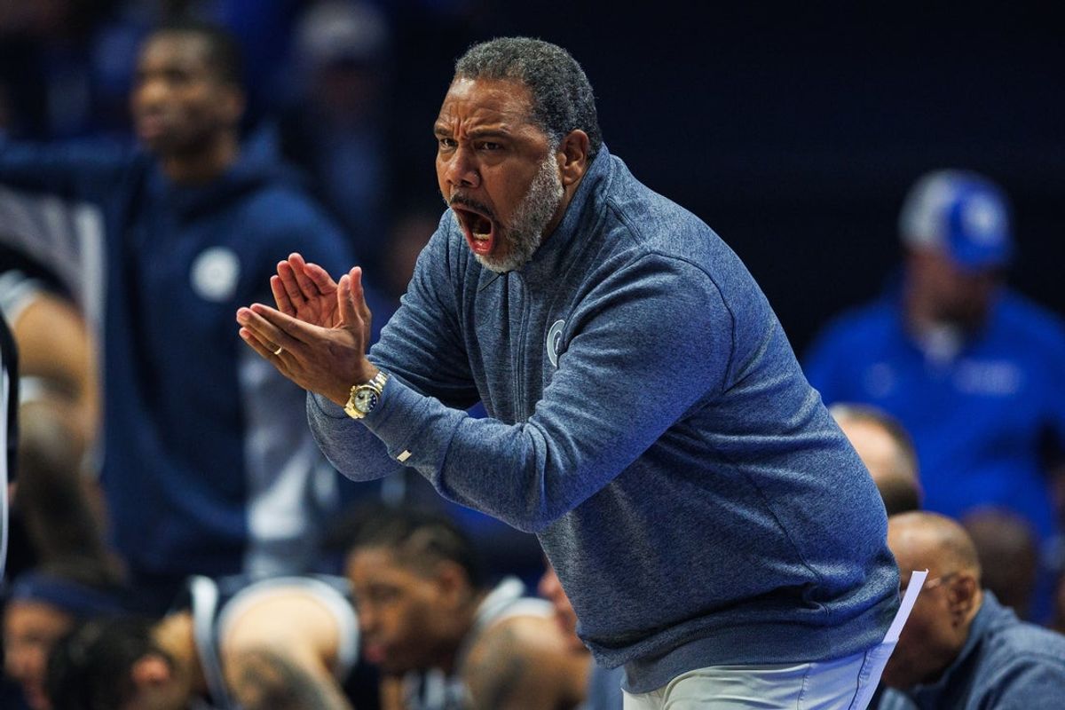 Oct 30, 2025; Lexington, KY, USA; Georgetown Hoyas head coach Ed Cooley cheers on his players during the first half against the Kentucky Wildcats at Rupp Arena at Central Bank Center. Mandatory Credit: Jordan Prather-Imagn Images