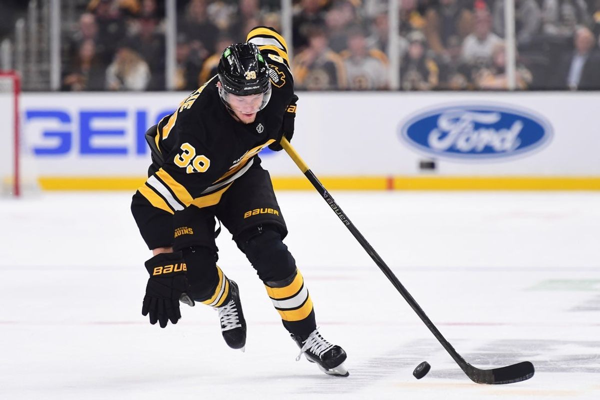 Oct 30, 2025; Boston, Massachusetts, USA; Boston Bruins center Morgan Geekie (39) controls the puck during the first period against the Buffalo Sabres at TD Garden. Mandatory Credit: Bob DeChiara-Imagn Images