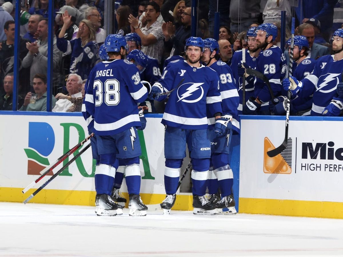 Oct 30, 2025; Tampa, Florida, USA; Tampa Bay Lightning left wing Brandon Hagel (38) is congratulated for scoring against the Dallas Stars during the second period at Benchmark International Arena. Mandatory Credit: Kim Klement Neitzel-Imagn Images