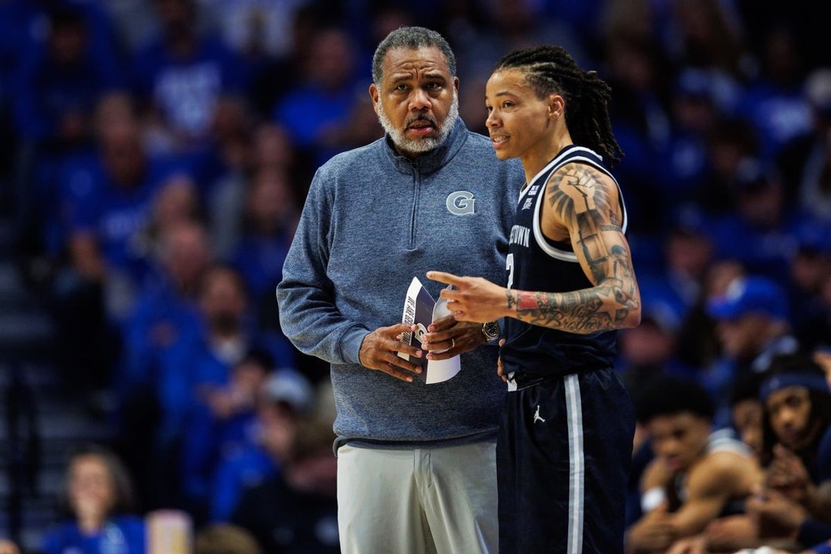 Oct 30, 2025; Lexington, KY, USA; Georgetown Hoyas guard Malik Mack (2) talks with head coach Ed Cooley during the second half against the Kentucky Wildcats at Rupp Arena at Central Bank Center. Mandatory Credit: Jordan Prather-Imagn Images