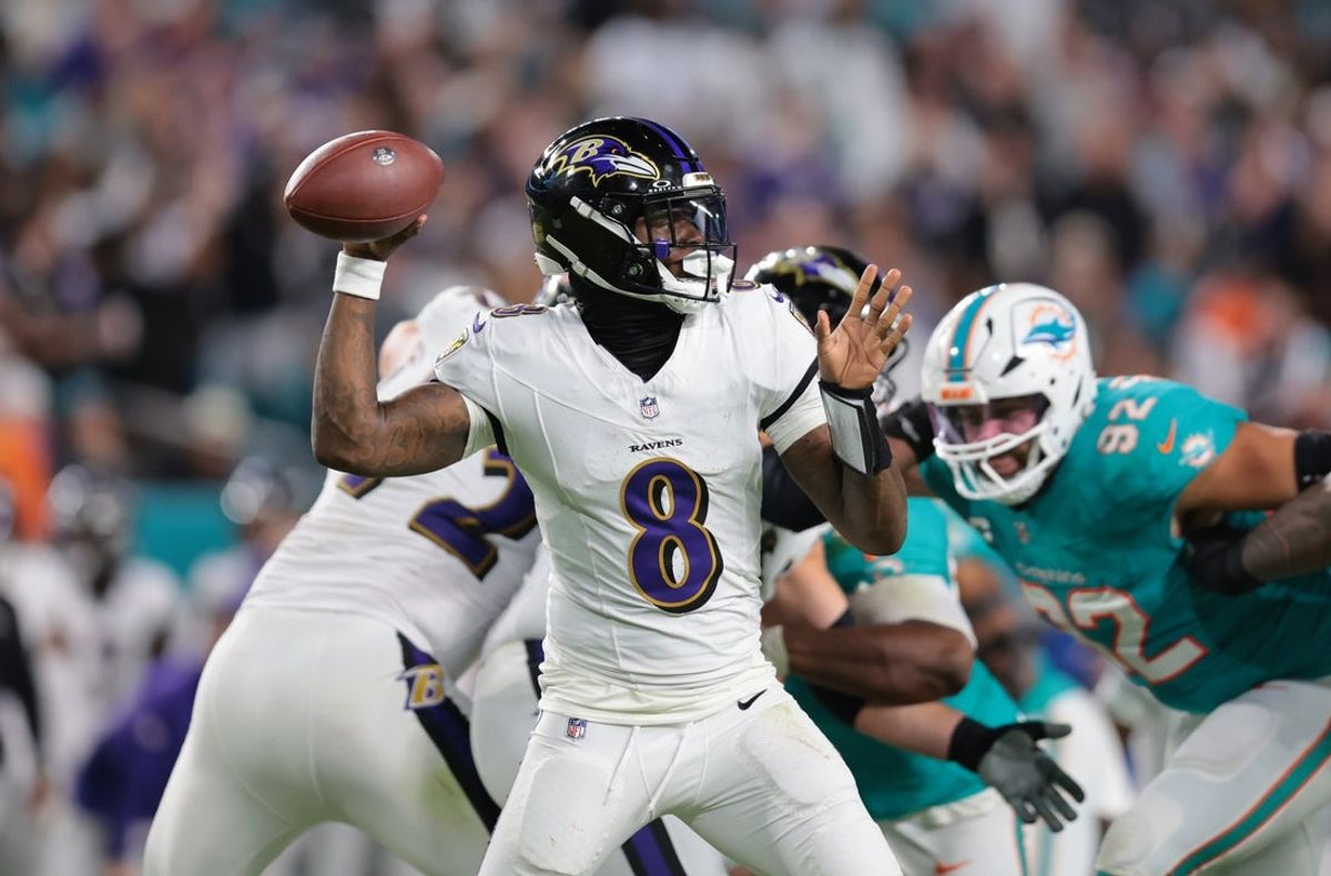 Oct 30, 2025; Miami Gardens, Florida, USA; Baltimore Ravens quarterback Lamar Jackson (8) throws downfield during the second quarter against the Miami Dolphins at Hard Rock Stadium. Mandatory Credit: Sam Navarro-Imagn Images