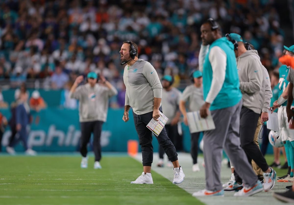 Oct 30, 2025; Miami Gardens, Florida, USA; Miami Dolphins offensive coordinator Frank Smith stands on the sidelines during the second quarter against the Baltimore Ravens at Hard Rock Stadium. Mandatory Credit: Sam Navarro-Imagn Images