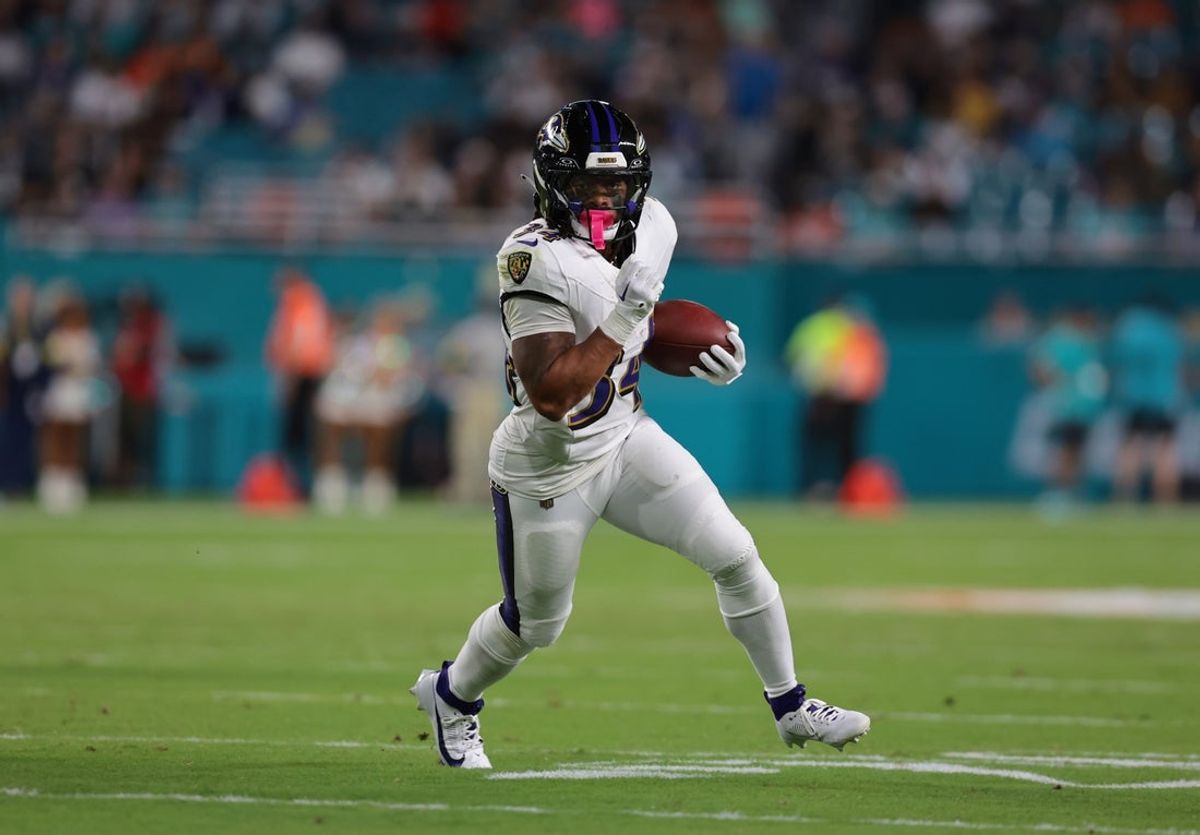 Oct 30, 2025; Miami Gardens, Florida, USA; Baltimore Ravens running back Keaton Mitchell (34) runs for a gain during the third quarter against the Miami Dolphins at Hard Rock Stadium. Mandatory Credit: Sam Navarro-Imagn Images