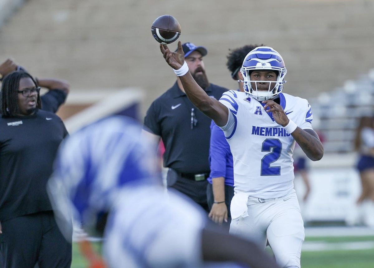 Oct 31, 2025; Houston, Texas, USA; Memphis Tigers quarterback Brendon Lewis (2) passes during warmups  before playing against the Rice Owls at Rice Stadium. Mandatory Credit: Thomas Shea-Imagn Images