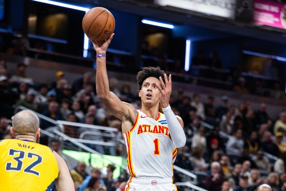 Oct 31, 2025; Indianapolis, Indiana, USA; Atlanta Hawks forward Jalen Johnson (1) shoots the ball while Indiana Pacers center Jay Huff (32) defends in the second half at Gainbridge Fieldhouse. Mandatory Credit: Trevor Ruszkowski-Imagn Images