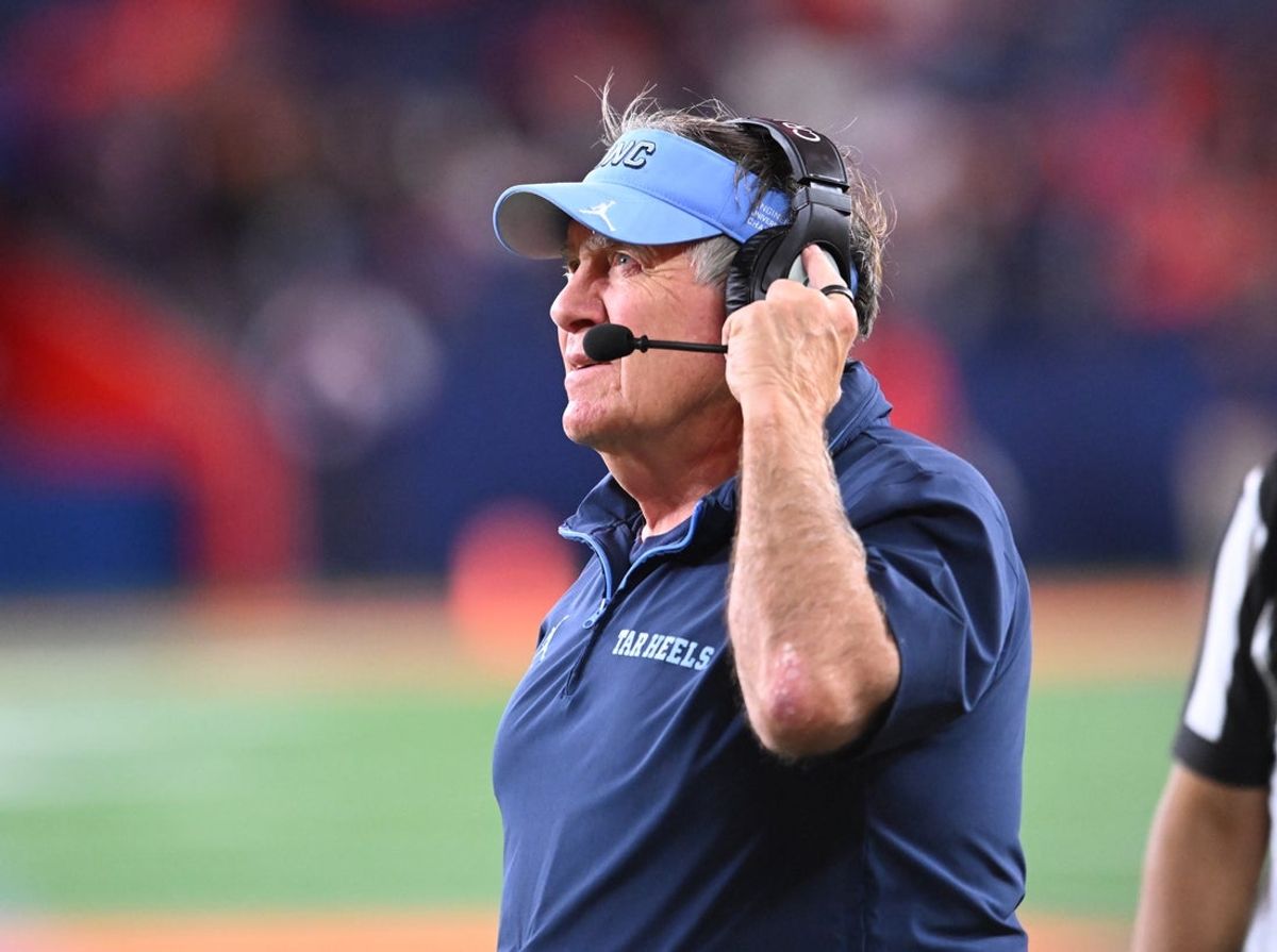 Oct 31, 2025; Syracuse, New York, USA; North Carolina Tar Heels head coach Bill Belichick looks to the clock in the fourth quarter game against the Syracuse Orange at the JMA Wireless Dome. Mandatory Credit: Mark Konezny-Imagn Images