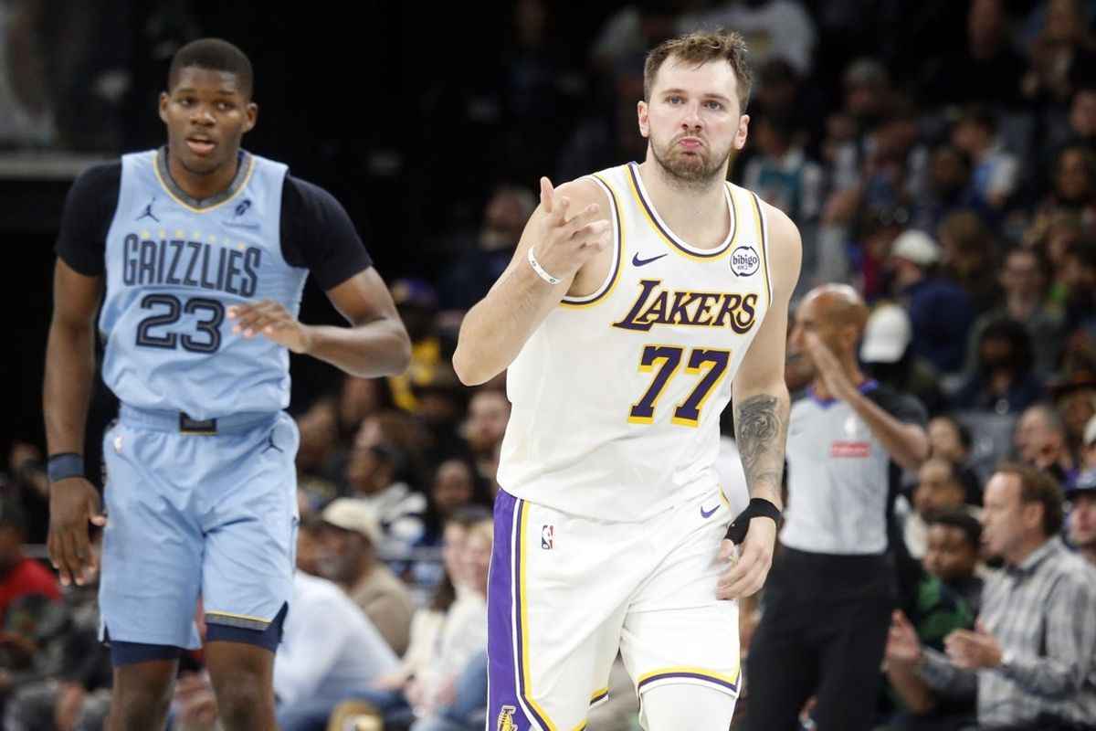 Oct 31, 2025; Memphis, Tennessee, USA; Los Angeles Lakers guard Luka Doncic (77) reacts during the fourth quarter against the Memphis Grizzlies at FedExForum. Mandatory Credit: Petre Thomas-Imagn Images
