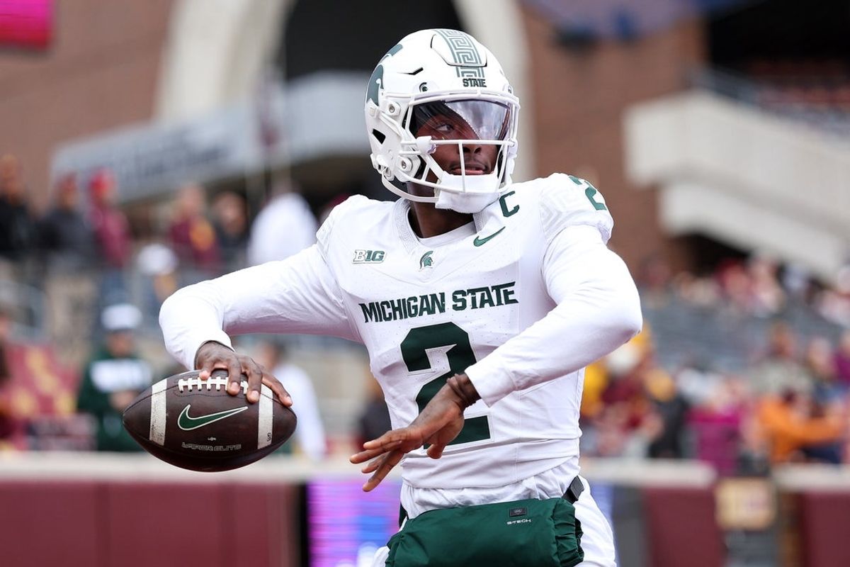 Nov 1, 2025; Minneapolis, Minnesota, USA; Michigan State Spartans quarterback Aidan Chiles (2) warms up before the game against the Minnesota Golden Gophers at Huntington Bank Stadium. Mandatory Credit: Matt Krohn-Imagn Images