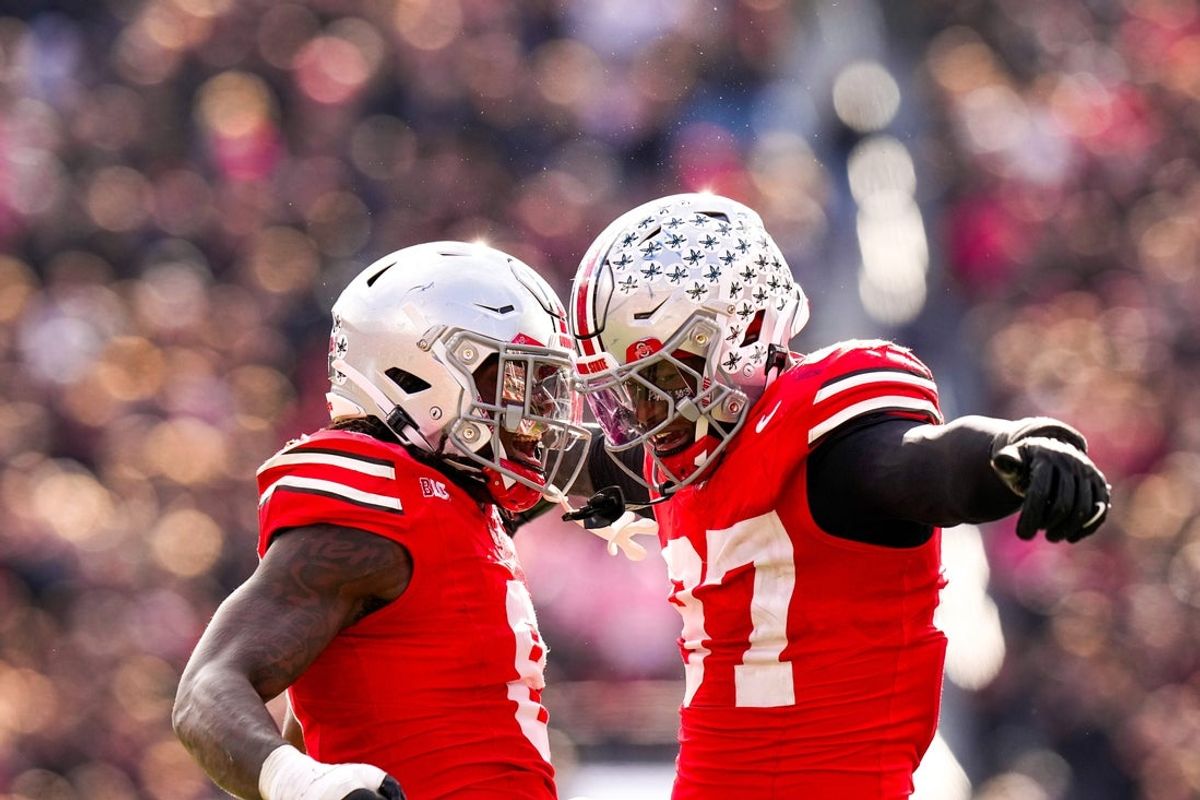 Ohio State Buckeyes linebacker Arvell Reese (8) and defensive end Kenyatta Jackson Jr. (97) celebrate in the second half of the college football game at Ohio Stadium on Saturday, Nov. 1, 2025 in Columbus, Ohio.