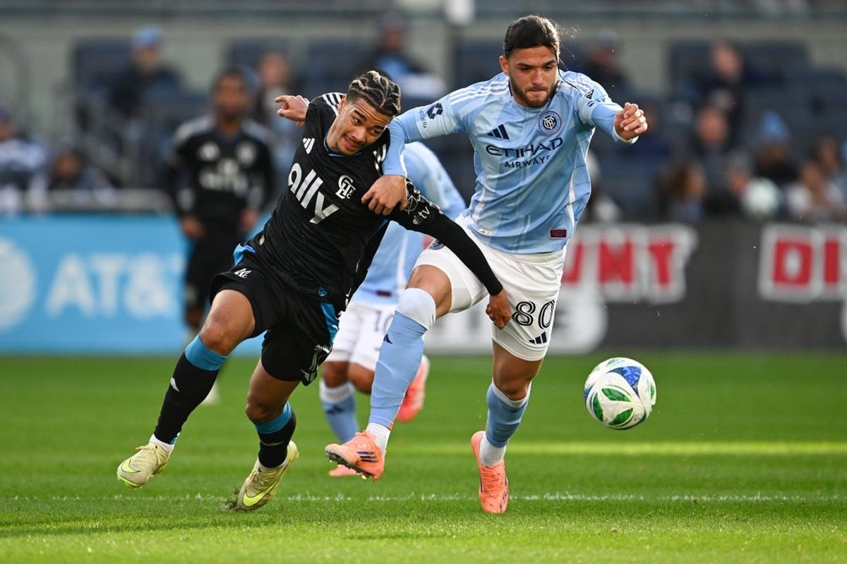 Nov 1, 2025; New York, New York, USA; New York City FC midfielder Justin Haak (80) fights for the ball against Charlotte FC forward Idan Toklomati (17) during the first half at Yankee Stadium. Mandatory Credit: Mark Smith-Imagn Images