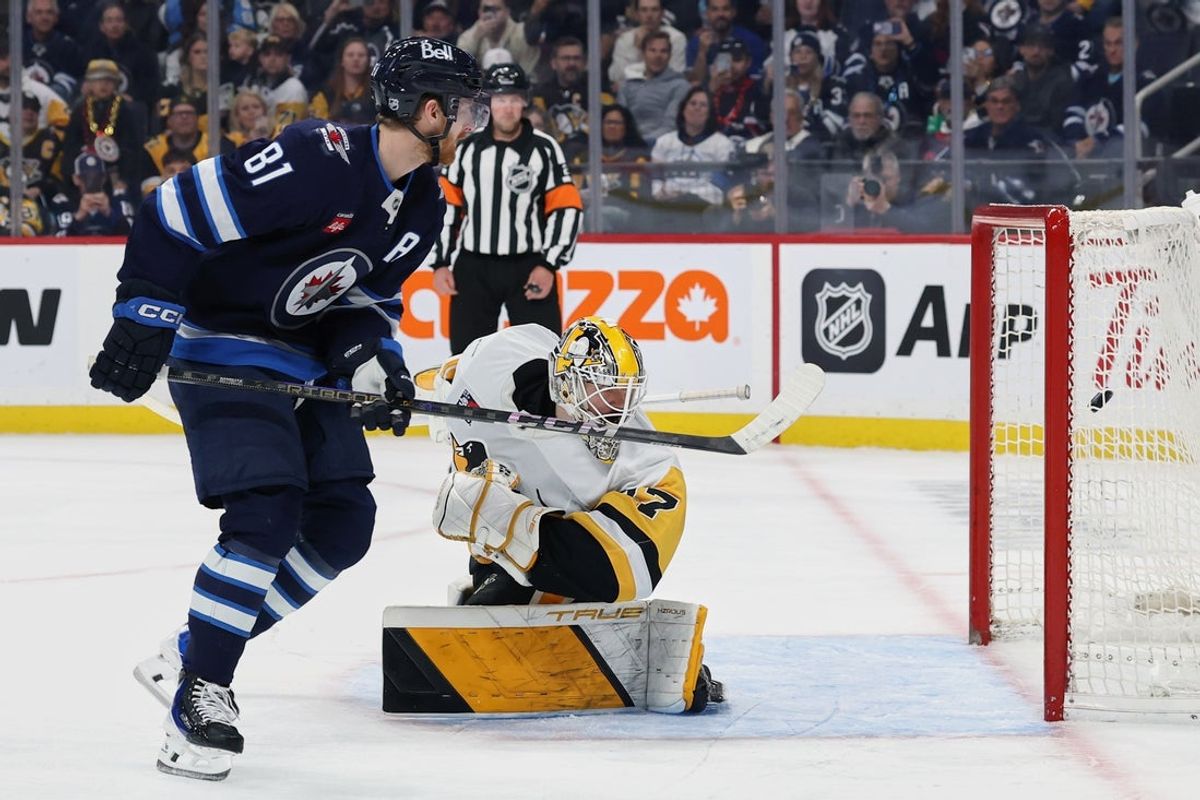 Nov 1, 2025; Winnipeg, Manitoba, CAN; Winnipeg Jets left wing Kyle Connor (81) scores a goal on a penalty shot against Pittsburgh Penguins goaltender Arturs Silovs (37) in the second period at Canada Life Centre. Mandatory Credit: James Carey Lauder-Imagn Images