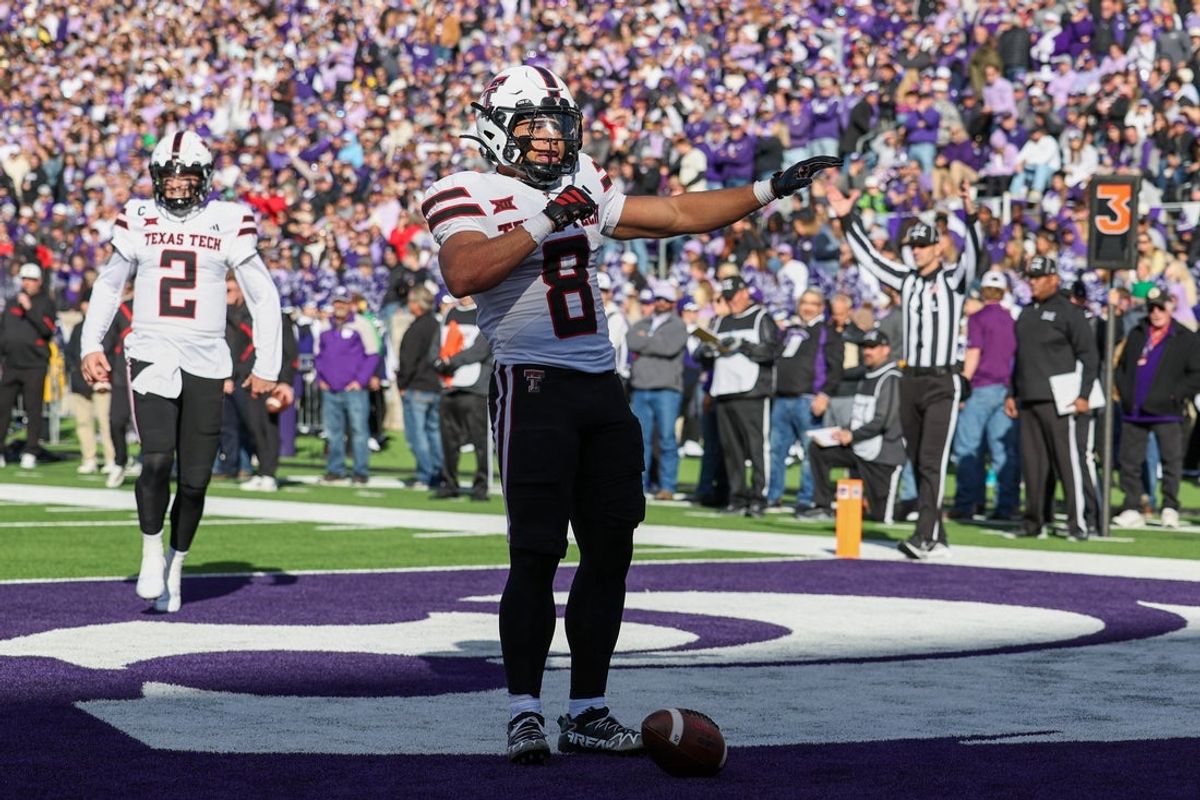 Nov 1, 2025; Manhattan, Kansas, USA; Texas Tech Red Raiders running back Cameron Dickey (8) celebrates after scoring a touchdown in the second quarter against the Kansas State Wildcats at Bill Snyder Family Football Stadium. Mandatory Credit: Scott Sewell-Imagn Images