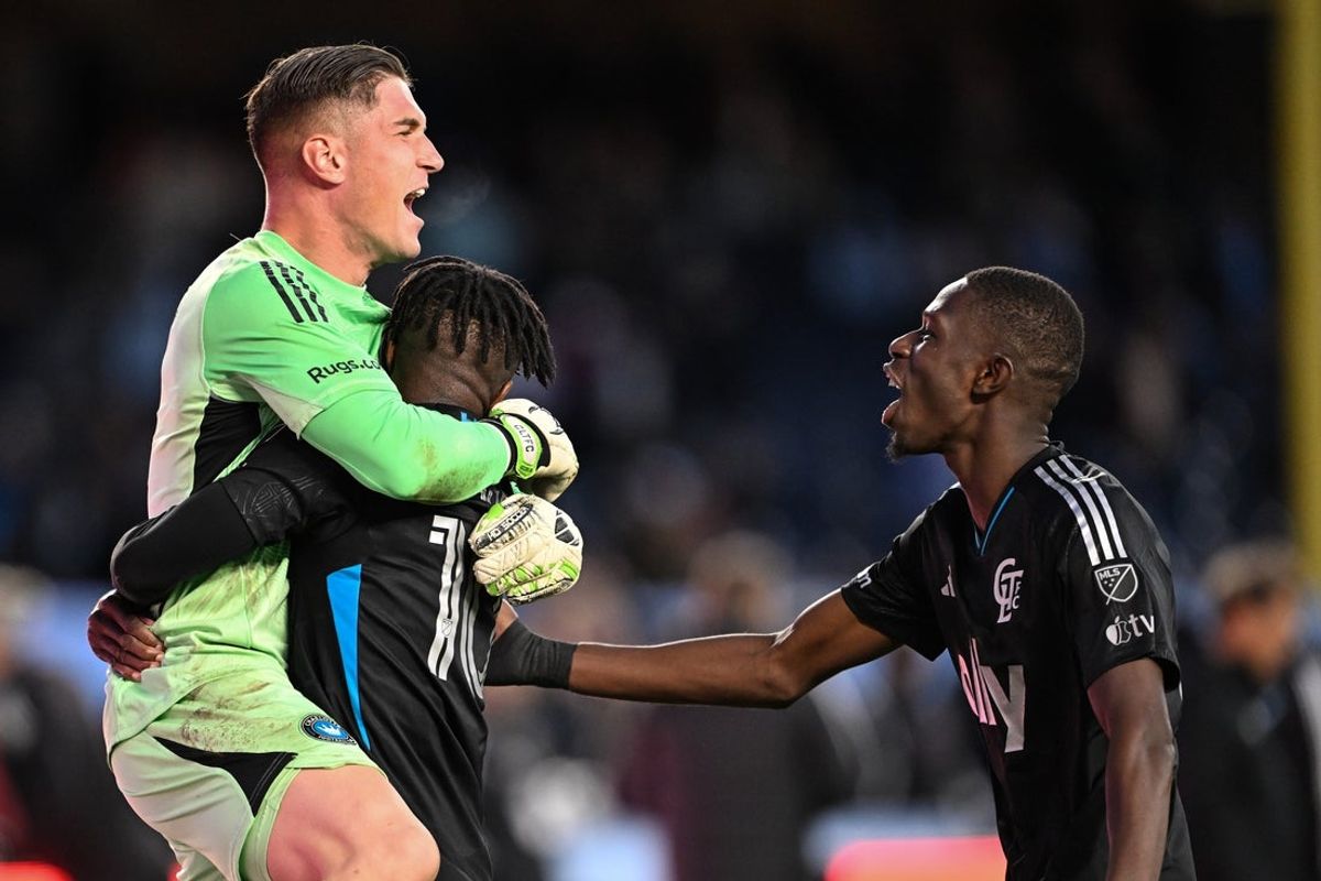 Nov 1, 2025; New York, New York, USA; Charlotte FC forward Wilfried Zaha (10) Charlotte FC goalkeeper Kristijan Kahlina (1) and Charlotte FC midfielder Djibril Diani (28) react to the win against New York City FC at Yankee Stadium. Mandatory Credit: Mark Smith-Imagn Images