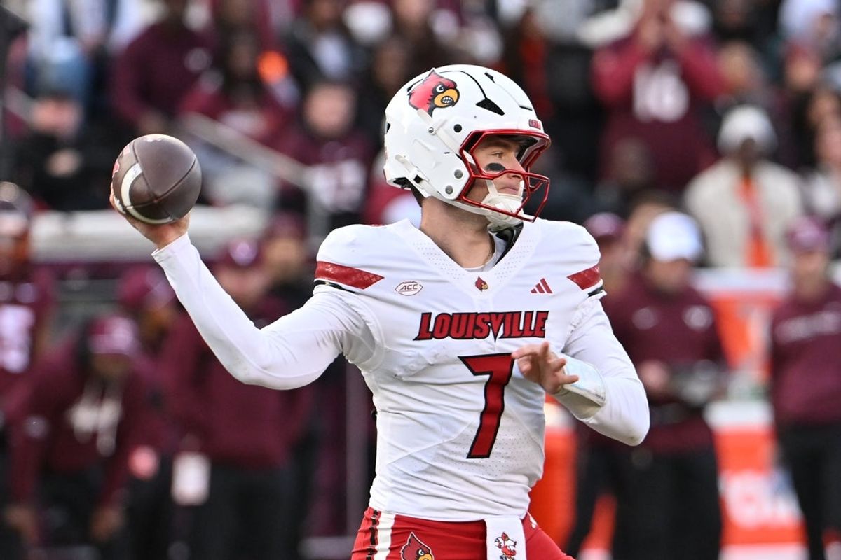 Nov 1, 2025; Blacksburg, Virginia, USA;  Louisville Cardinals quarterback Miller Moss (7) throws a pass against the Virginia Tech Hokies during the third quarter at Lane Stadium. Mandatory Credit: Brian Bishop-Imagn Images