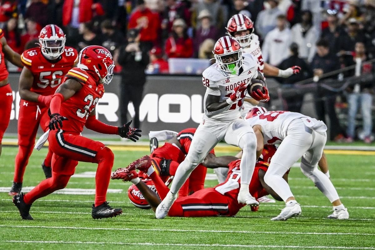 Nov 1, 2025; College Park, Maryland, USA;  Indiana Hoosiers running back Khobie Martin (28) rushes during the second half against the Maryland Terrapins at SECU Stadium. Mandatory Credit: Tommy Gilligan-Imagn Images